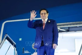 越南政府总理范明政抵达河内，圆满结束对老挝的访问。图自越通社