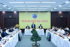 工作会议现场。图自越通社