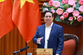 越南政府总理范明政发表讲话。图自越通社