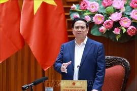 越南政府总理范明政发表讲话。图自越通社