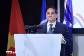 越南总理范明政出席论坛。图自越通社