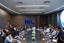 会议现场。图自越通社