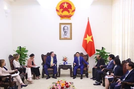 会见场景。图自越通社