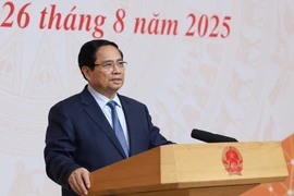 越南政府总理范明政发表讲话。图自越通社
