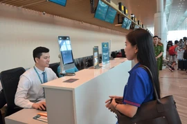 新山一国际机场启用生物识别认证系统应用程序。图自越通社