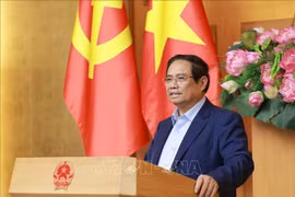 范明政总理发表讲话。图自越通社