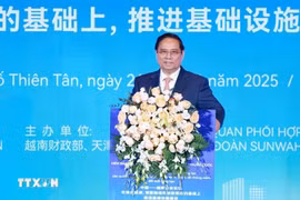 越南政府总理范明政发表讲话。图自越通社