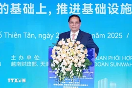 越南政府总理范明政发表讲话。图自越通社