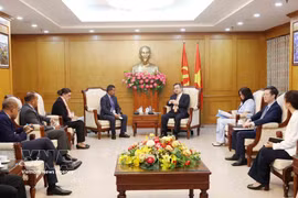 会见现场。图自越通社