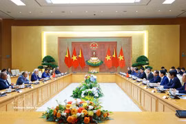 会谈现场。图自越通社