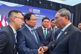 越南政府总理范明政会见中国国务院总理李强。图自越通社