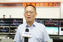 广西柳州铁道职业技术学院校长覃海波。图自越通社
