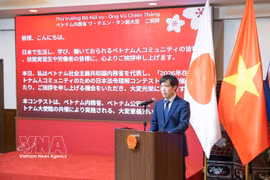 越南驻日本大使馆一等秘书、劳务管理委员会主任潘进黄发表讲话。图自越通社