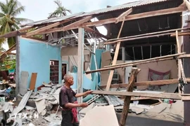 泰国乌汶叻差他尼府一处住宅在与柬埔寨的冲突中被炮弹击中。图自越通社