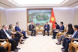 会见现场。图自越通社