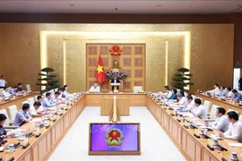 会议现场。图自越通社