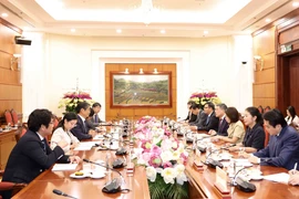 会见现场。图自越通社