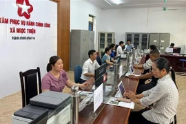 实行两级地方政权三日内 行政服务中心运转通畅。图自越通社