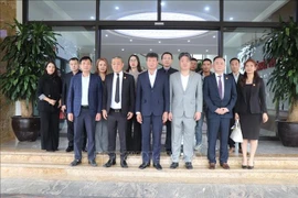 双方代表合影。图自越通社