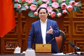 越南政府总理范明政主持会议。图自越通社