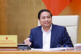 范明政总理发表总结讲话。图自越通社