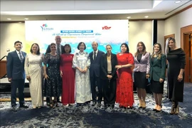 与会代表合影。图自越通社