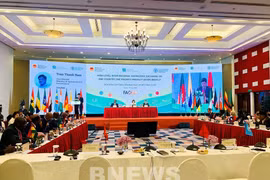 会议场景。图自越通社