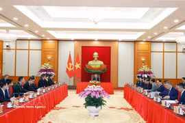 会见现场。图自越通社