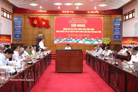 会议场景。图自越通社