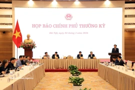 会议场景。图自越通社