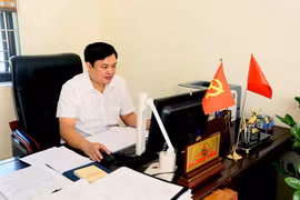山罗省芒班乡党委书记何忠。图自越通社