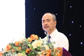 海外越南人国家委员会主任阮忠坚主持活动。图自越通社