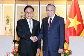 越共中央总书记苏林会见原越南驻韩国名誉总领事朴洙宽。图自越通社