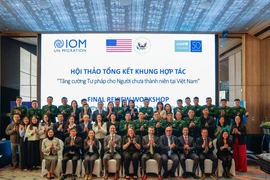 参会代表合影。图自越通社