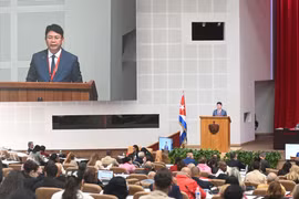 越南司法部部长阮清静分享越南完善法律体系的经验。图自越通社
