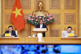 范明政在国家重点交通工程项目指导委员会第22次会议上发表讲话。图自越通社