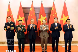 越中外交、国防、公安“3+3”战略对话机制首次部长级会议上的两国外交部长、国防部长和公安部长。图自越通社