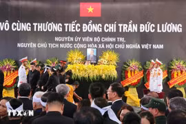 原越南国家主席陈德良追悼会按国葬规格在陈圣宗街5号国家殡仪馆举行。图自越通社