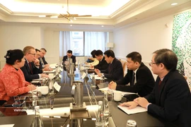 会见现场。图自越通社