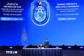越南公安部部长梁三光签署《联合国打击网络犯罪公约》。图自越通社