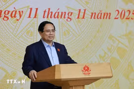 越南政府总理范明政主持召开关于发展保障性住房的会议。图自越通社