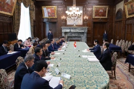 陈光方会见日本参议院议长关口昌一。图自越通社