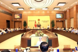 会议场景。图自越通社