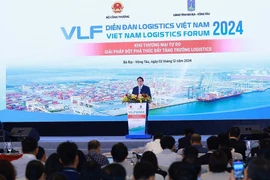 资料图:范明政出席2024年物流论坛。图自越通社