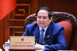越南政府总理范明政主持召开与CT集团领导的工作会议。图自越通社