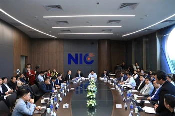 会议现场。图自越通社