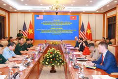 关于克服战后越南化学毒剂/二恶英后果项目的限制范围项目协议签署仪式现场。图自越通社