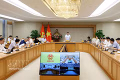 越南政府副总理阮文胜主持召开在越国际金融中心执行委员会第三次会议。投资越通社