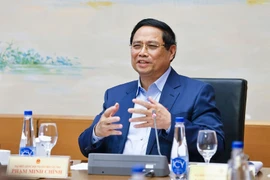 越南政府总理范明政发表讲话。图自越通社