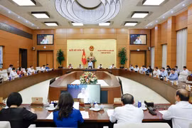 会议场景。图自越通社